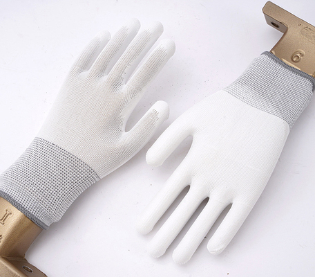 Anti gants statiques fonctionnants en nylon de travail 13 gants sans couture d'ESD d'ajustement de dessus de fibre de carbone de mesure